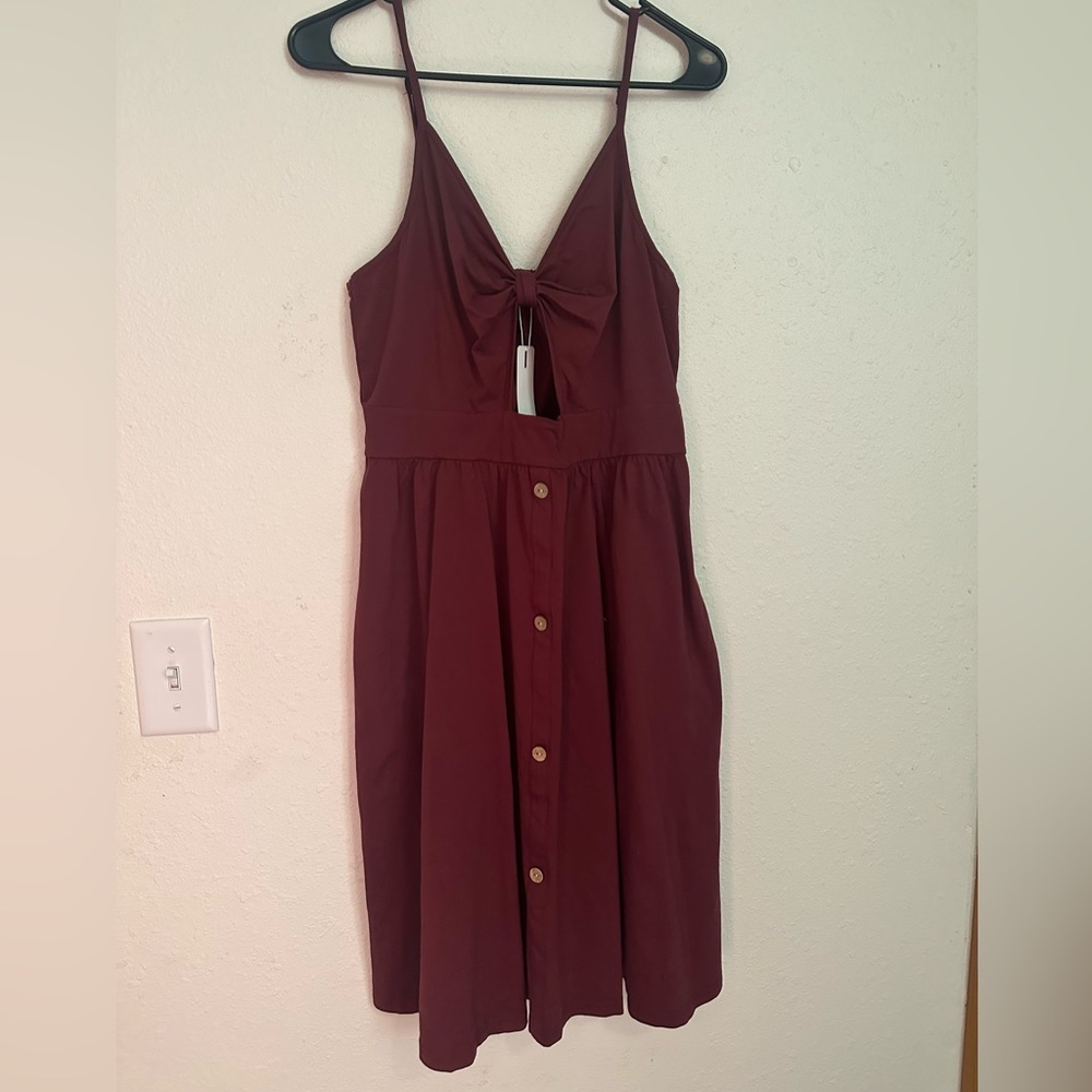 Mid length, cutout dress with pockets!